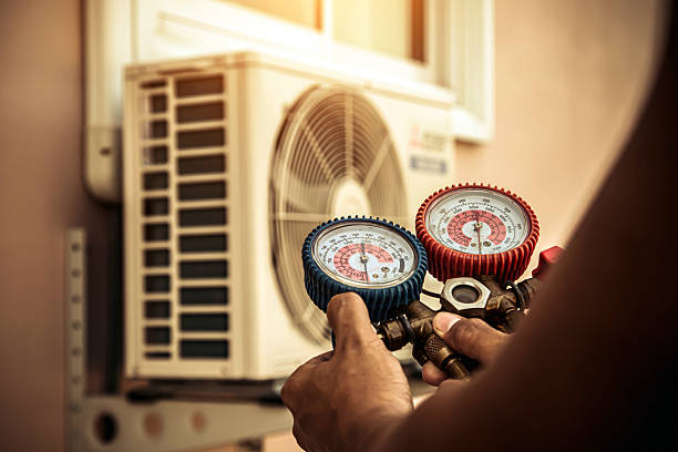 Professional Ac Installation technician working in Quinton, AL